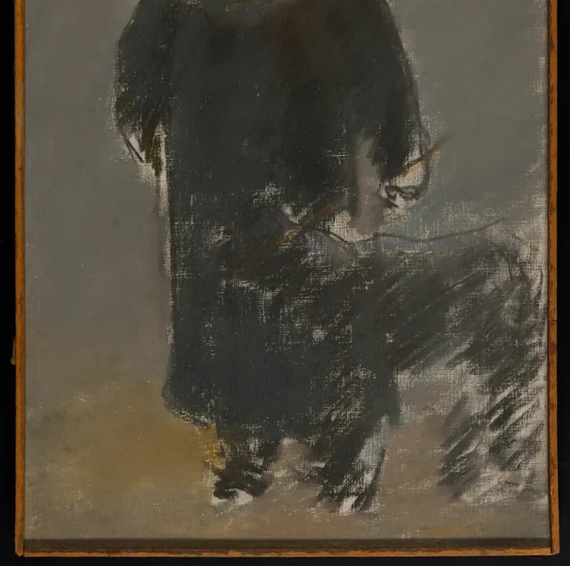 black dog at the feet